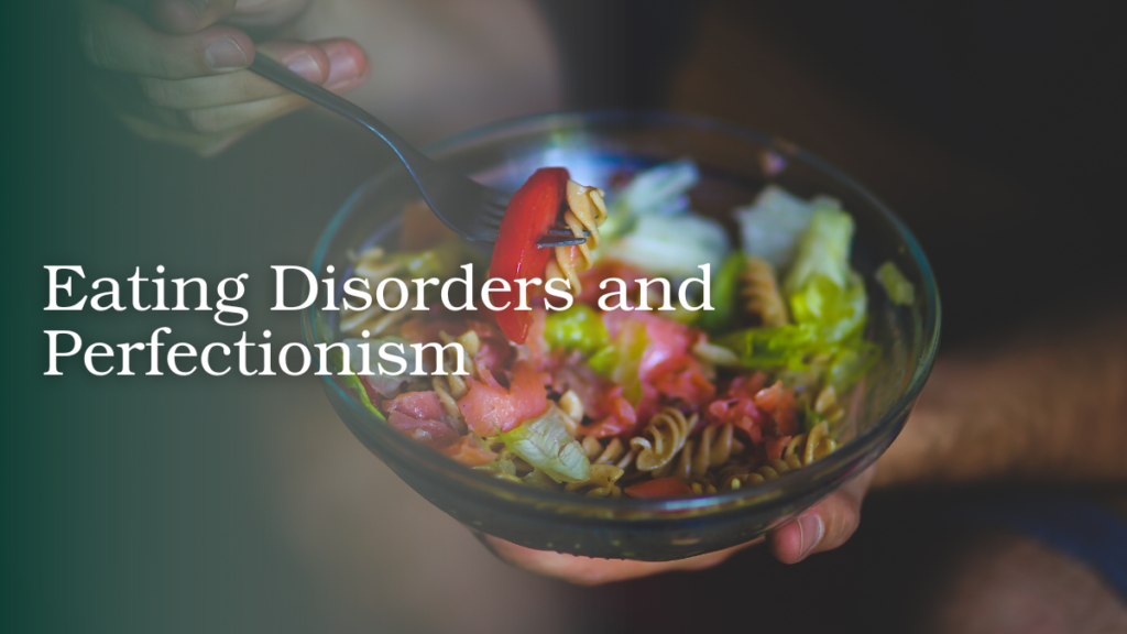 Person holding a bowl of food, illustrating perfectionism and rigid eating behaviors