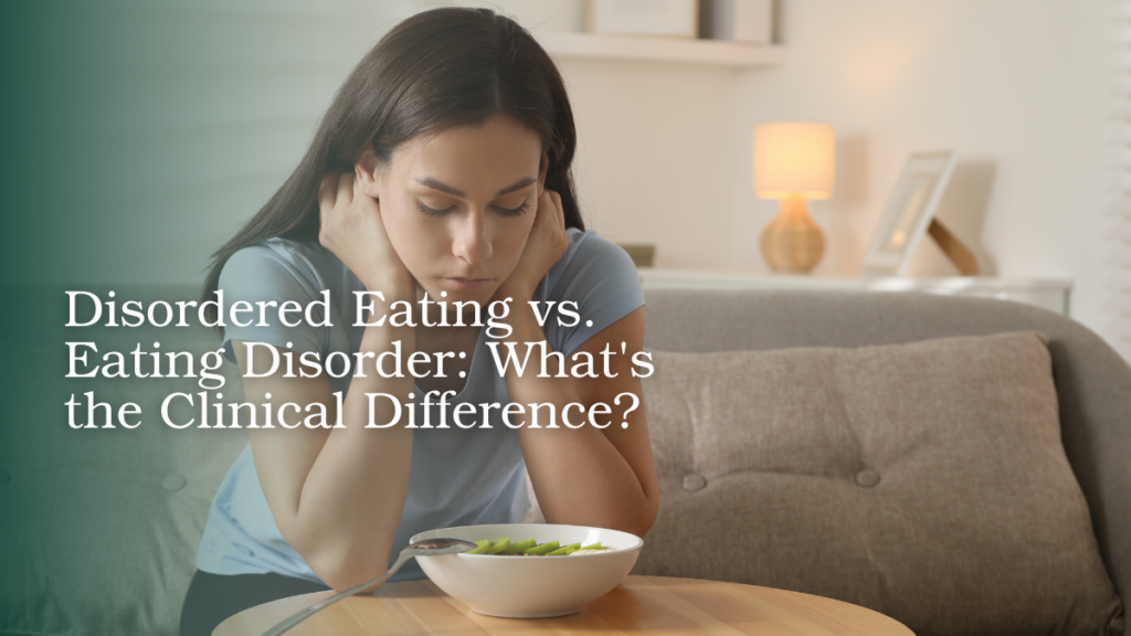 Woman sitting with food while experiencing concerns related to disordered eating
